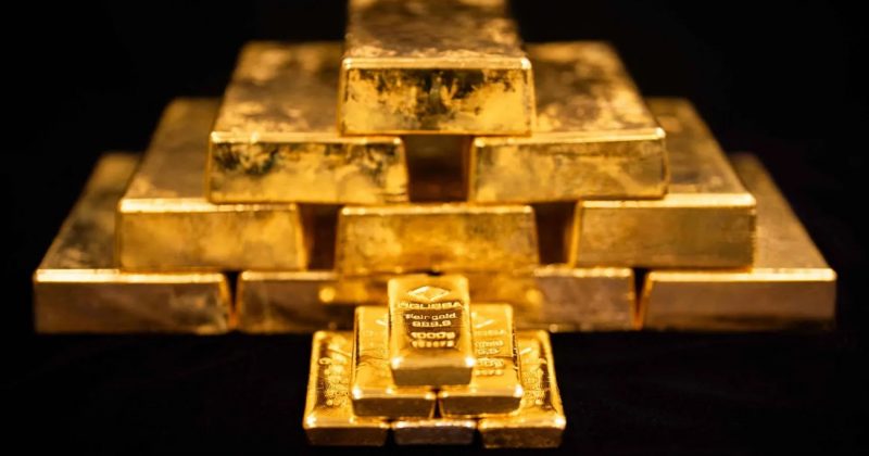 Gold Slumps as US-Iran Tensions Spike Oil Prices and Fed Rate Hike Looms